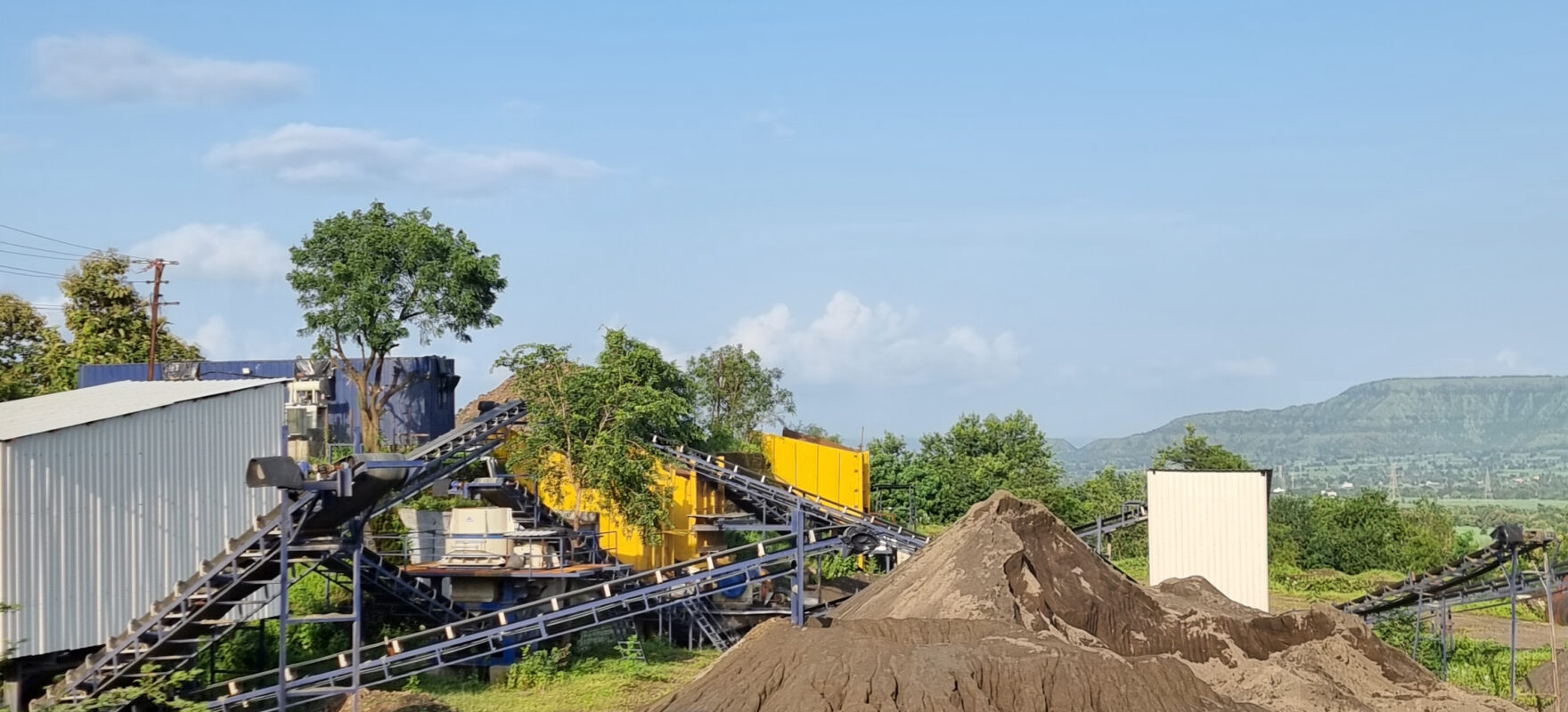 Construction materials including sand, aggregates, cement, steel, and industrial fillers used in modern building projects